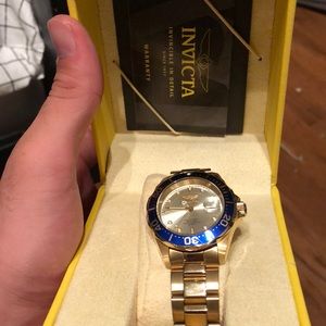 18k gold plated invicta diver watch.